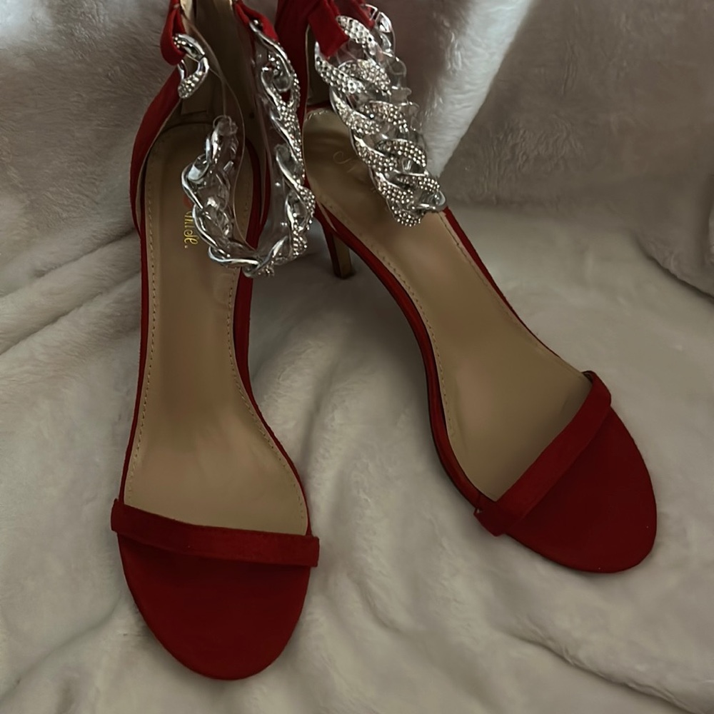 Red heels with silver chain